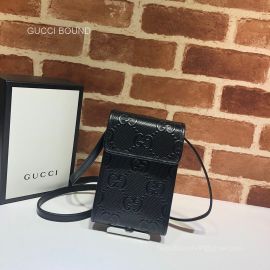 Gucci GG embossed mini bag 625571 213268