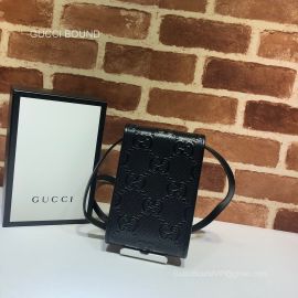 Gucci GG embossed mini bag 625571 213268