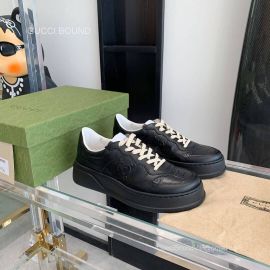 Gucci GG Embossed Leather Platform Sneakers in Black Unisex 2281262