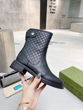 Gucci GG Embossed Leather Ankle Boot in Black 2281450