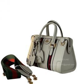 Gucci Mini Canvas Top Handle Duffle Bag in White Smooth Leather 715771