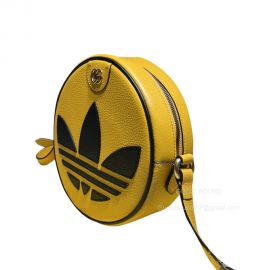 Gucci x adidas ophidia round shoulder bag in yellow leather 702626