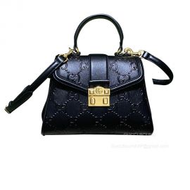 Gucci Top Handle Bag Gucci Small GG Shoulder Bag in Black Embossed GG Leather 675791