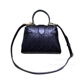 Gucci Top Handle Bag Gucci Small GG Shoulder Bag in Black Embossed GG Leather 675791