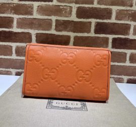 Gucci Jumbo GG Pouch Travel Bag Orange Jumbo GG Leather 739490