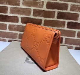 Gucci Jumbo GG Pouch Travel Bag Orange Jumbo GG Leather 739490